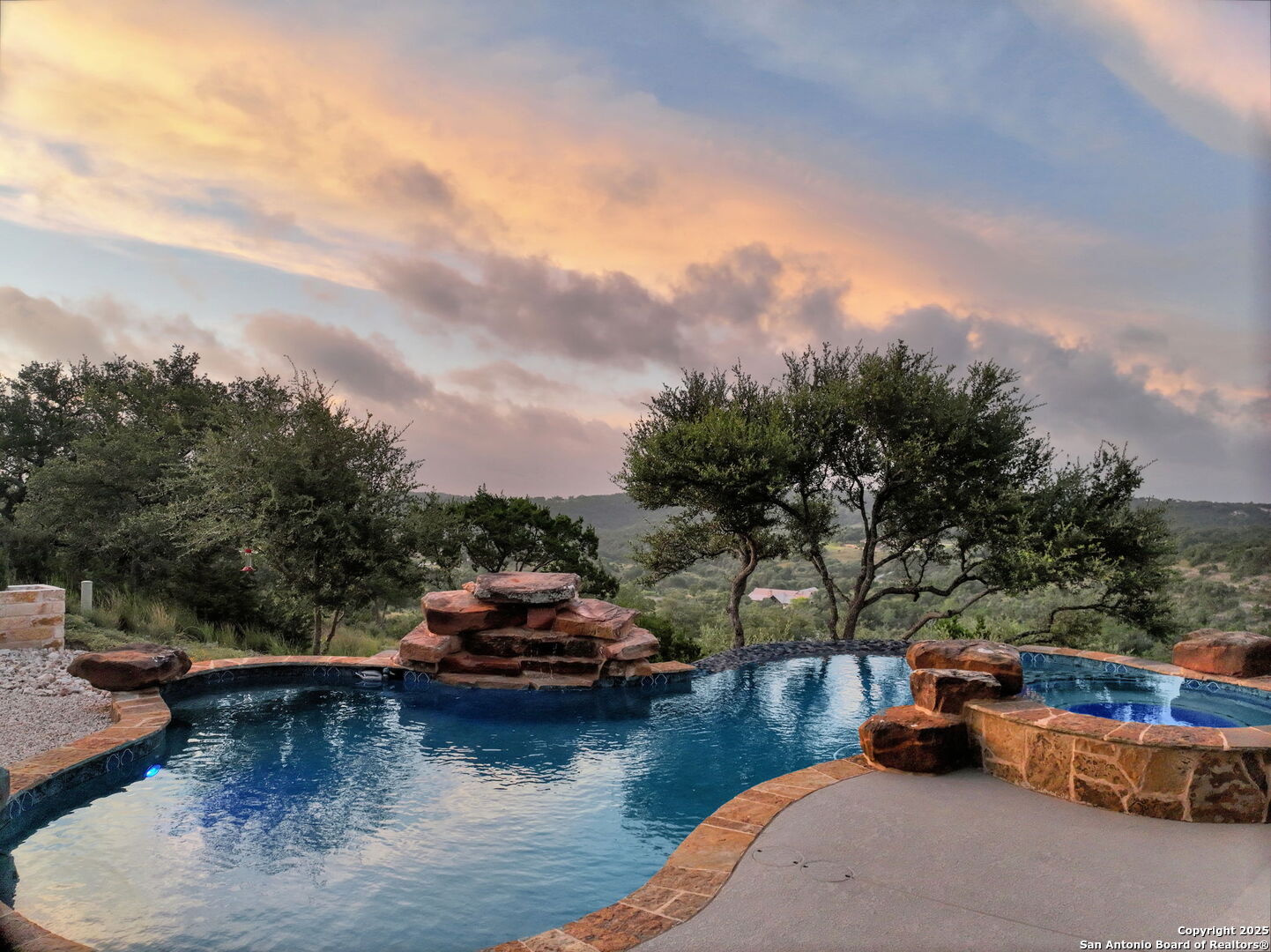 1023 Comanche Ridge New Braunfels, TX 78132 - Photo 75 of 109 a view of a lake with cars parked