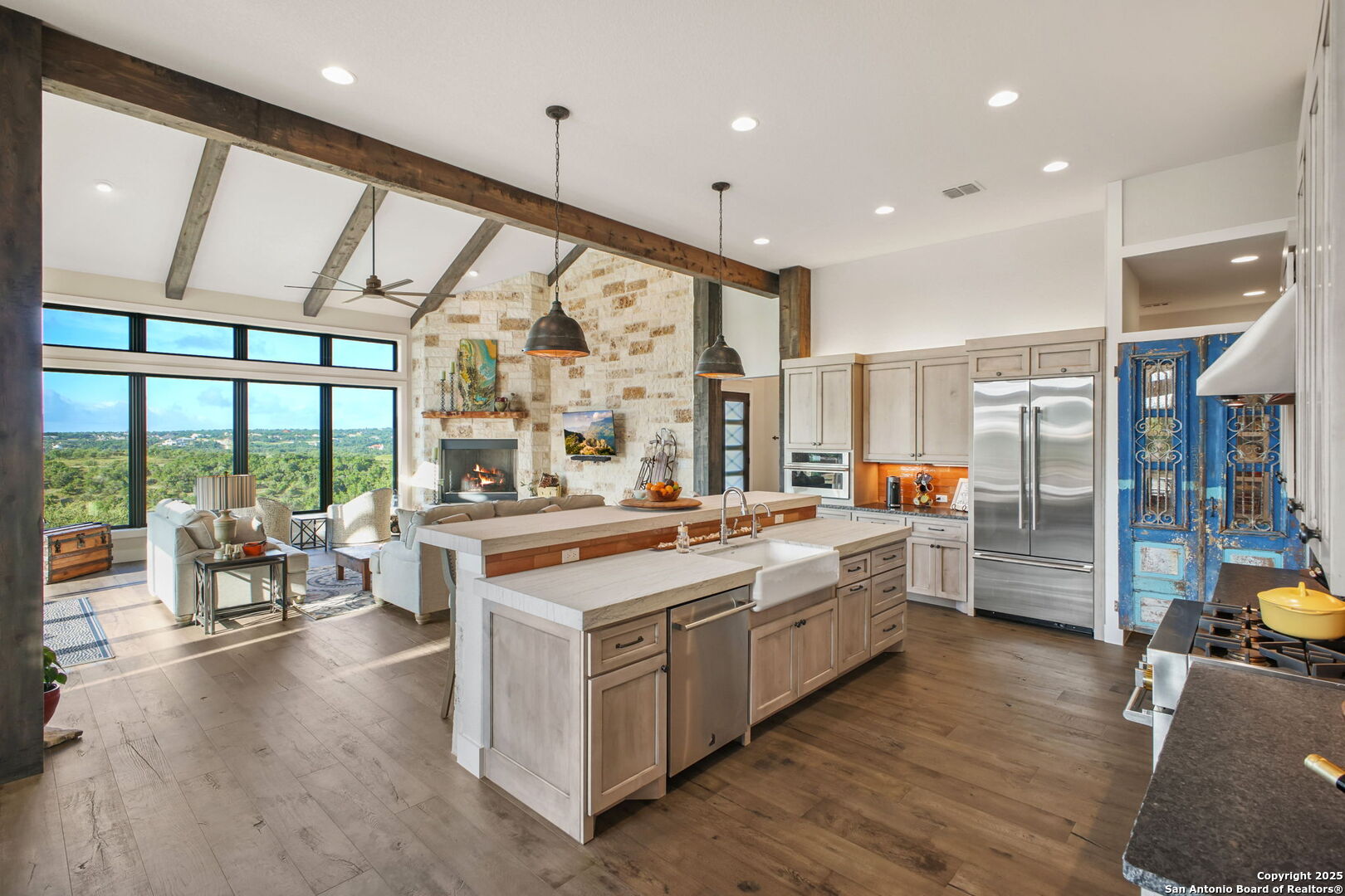 1023 Comanche Ridge New Braunfels, TX 78132 - Photo 8 of 109 a large white kitchen with lots of counter top space