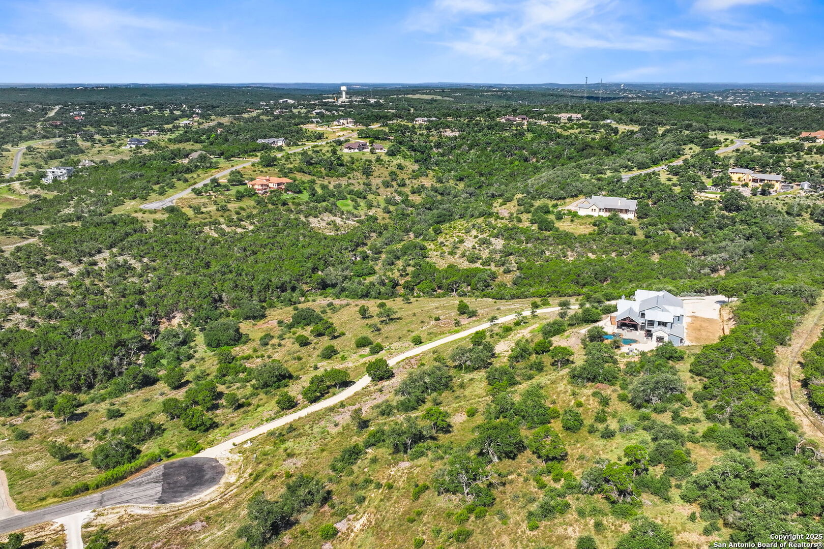 1023 Comanche Ridge New Braunfels, TX 78132 - Photo 93 of 109 a view of a city with lush green forest