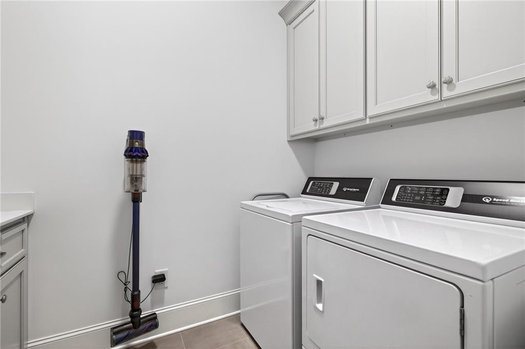 4774 Wieuca Road Northeast Atlanta, GA 30342 - Photo 27 of 52 a utility room with dryer and washer