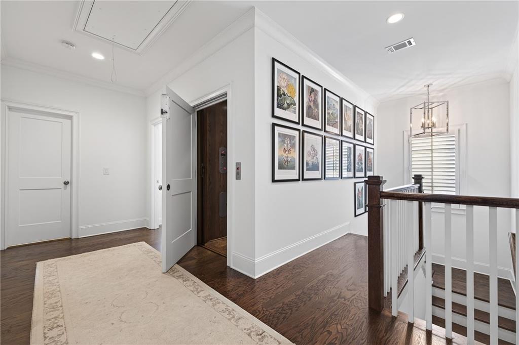 4774 Wieuca Road Northeast Atlanta, GA 30342 - Photo 29 of 52 a view of a hallway with windows