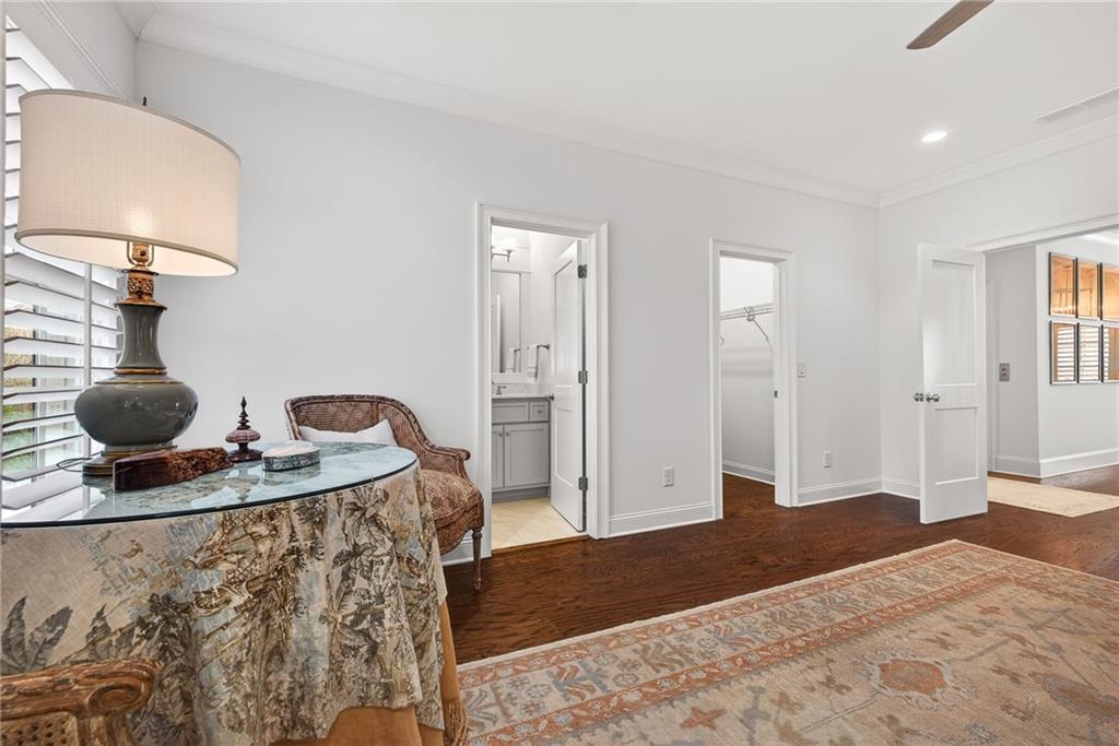 4774 Wieuca Road Northeast Atlanta, GA 30342 - Photo 34 of 52 a bedroom with a bed and cabinets