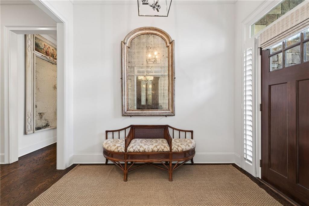 4774 Wieuca Road Northeast Atlanta, GA 30342 - Photo 8 of 52 a room with a window and a potted plant
