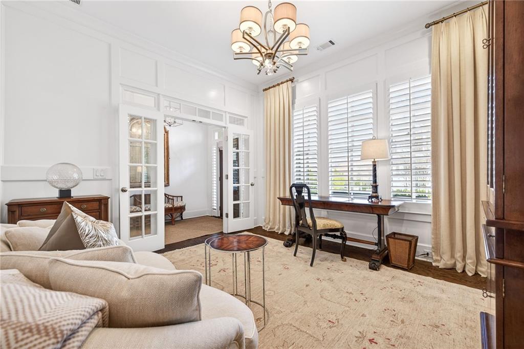 4774 Wieuca Road Northeast Atlanta, GA 30342 - Photo 9 of 52 a living room with furniture and a large window
