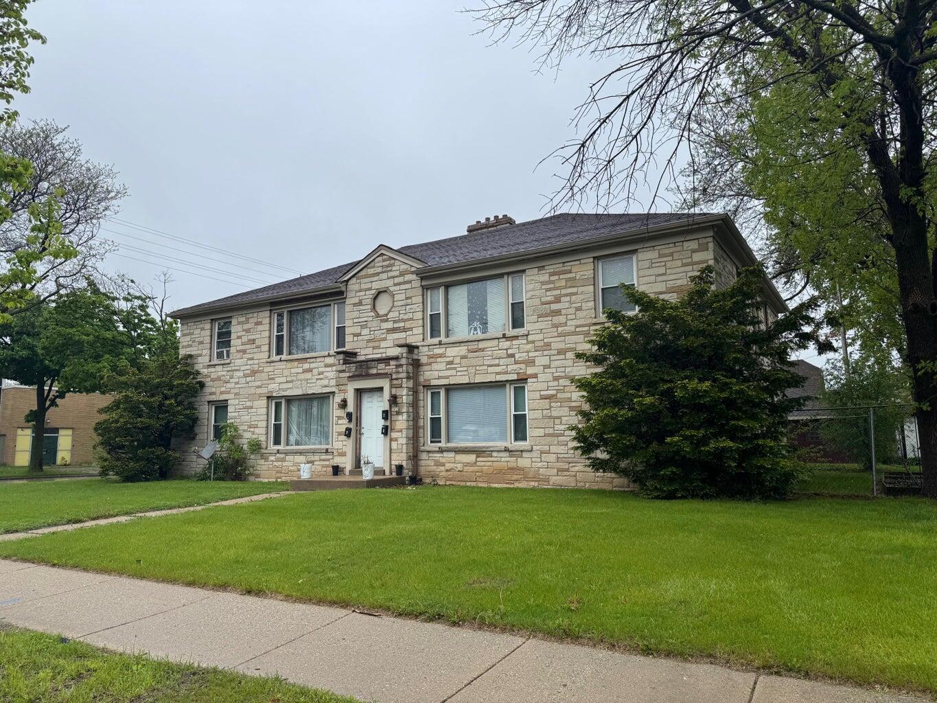 3910 North Sherman Boulevard Milwaukee, WI 53216 - Photo 2 of 3 Right Side