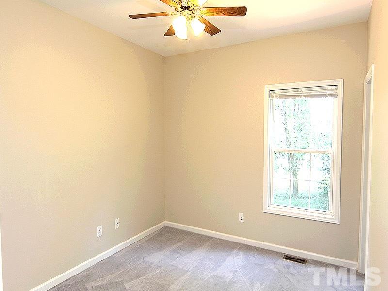 8718 Harps Mill Road Raleigh, NC 27615 - Photo 13 of 22 Another Secondary Bedroom with Walk in Closet and Ceiling Fan...