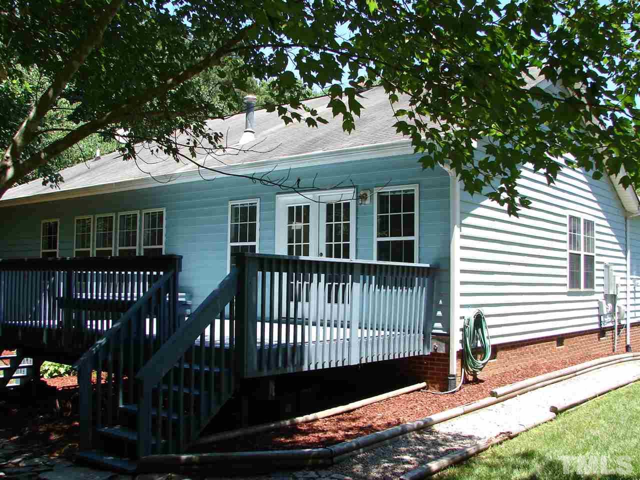 8718 Harps Mill Road Raleigh, NC 27615 - Photo 14 of 22 Expansive Deck to Enjoy your Private Backyard with Family and Friends with side walkway...
