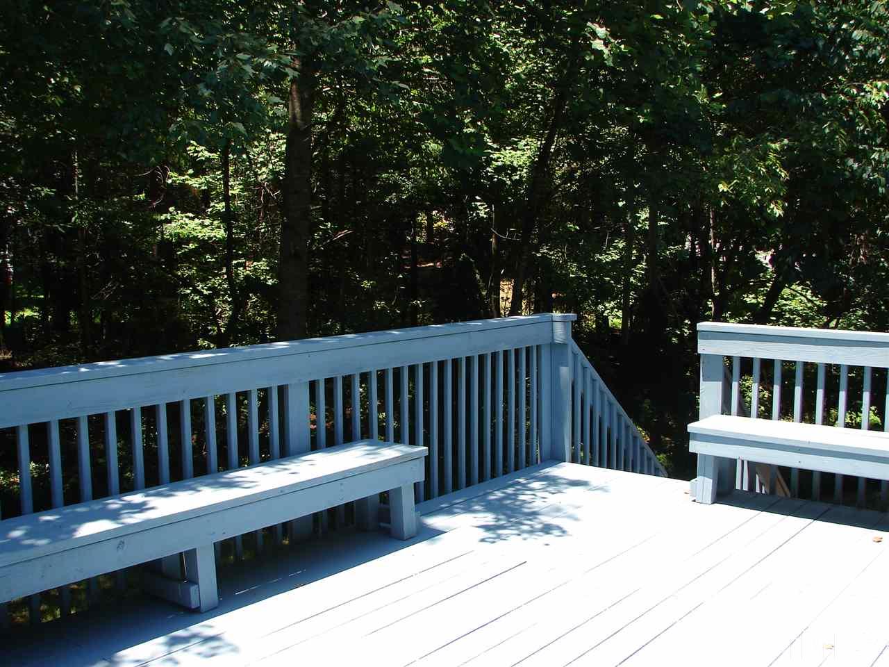 8718 Harps Mill Road Raleigh, NC 27615 - Photo 16 of 22 Expansive Deck offers View of Woods and Two Long Built In Seating Benches. Great for Entertaining !