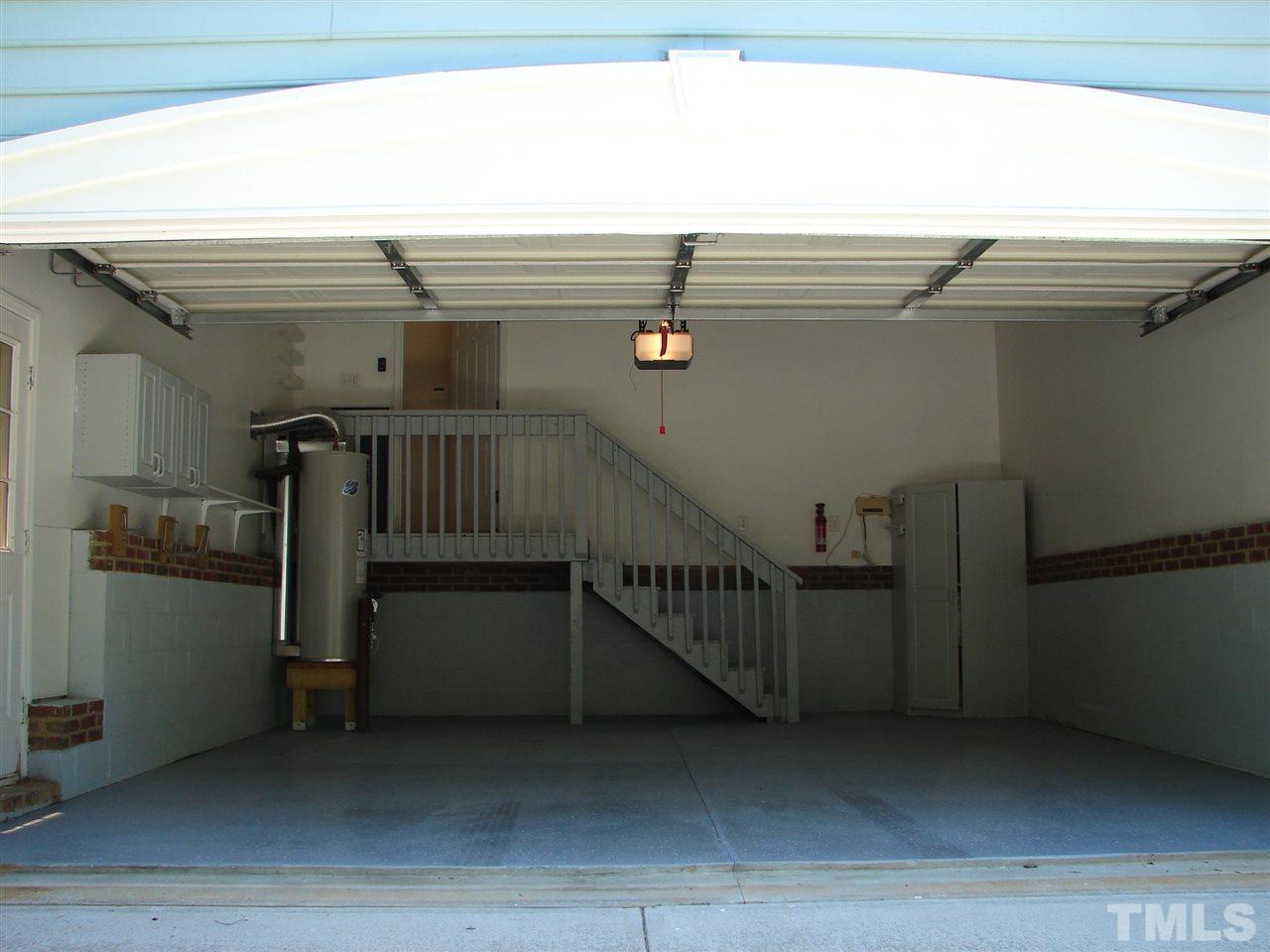 8718 Harps Mill Road Raleigh, NC 27615 - Photo 20 of 22 Two Car Front Entry Garage with Freshly Painted Floor and Newly Replaced Garage Springs 2015.