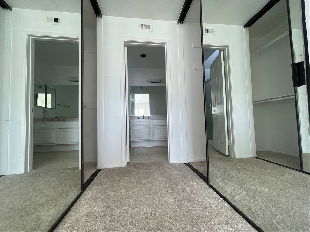 16 Wellesley Irvine, CA 92612 - Photo 13 of 25 an empty room with closet and a bathroom