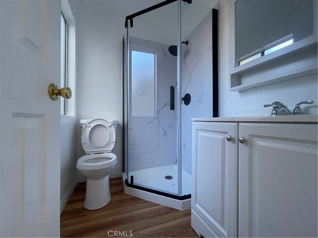 16 Wellesley Irvine, CA 92612 - Photo 10 of 25 a view of a bathroom with a shower and toilet