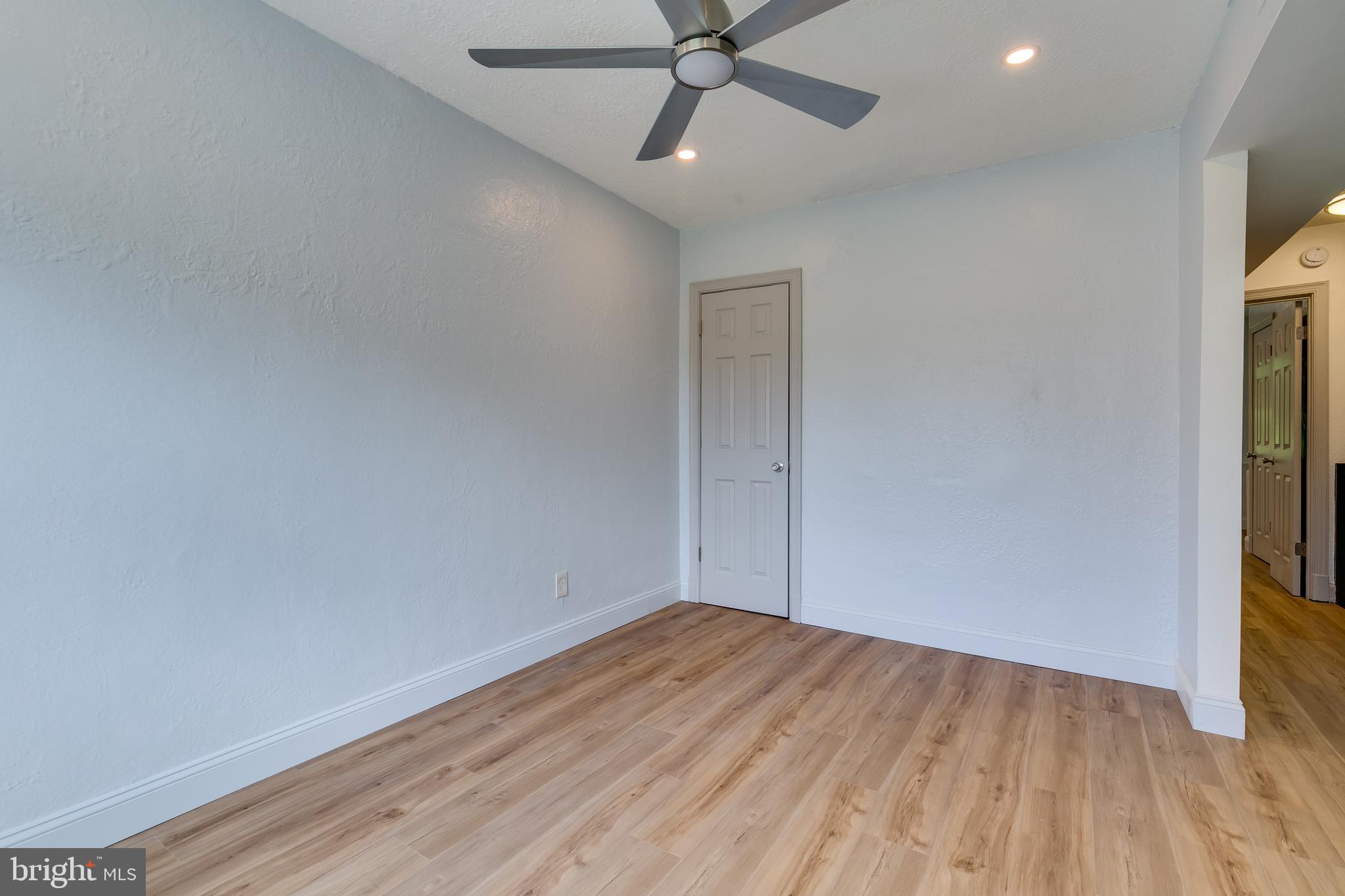 118 P Street Southwest Washington, DC 20024 - Photo 12 of 23 wooden floor in an empty room