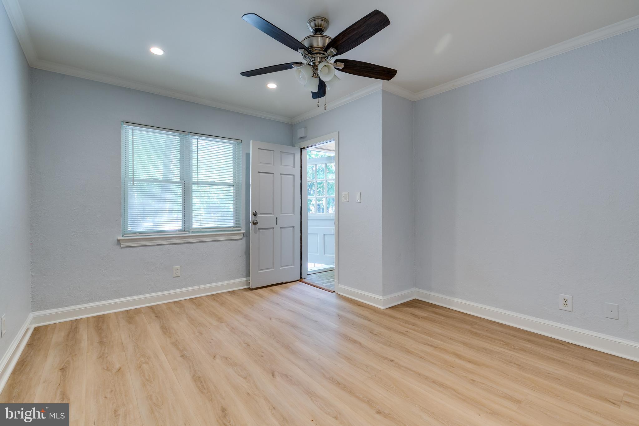 118 P Street Southwest Washington, DC 20024 - Photo 3 of 23 wooden floor in an empty room with a window
