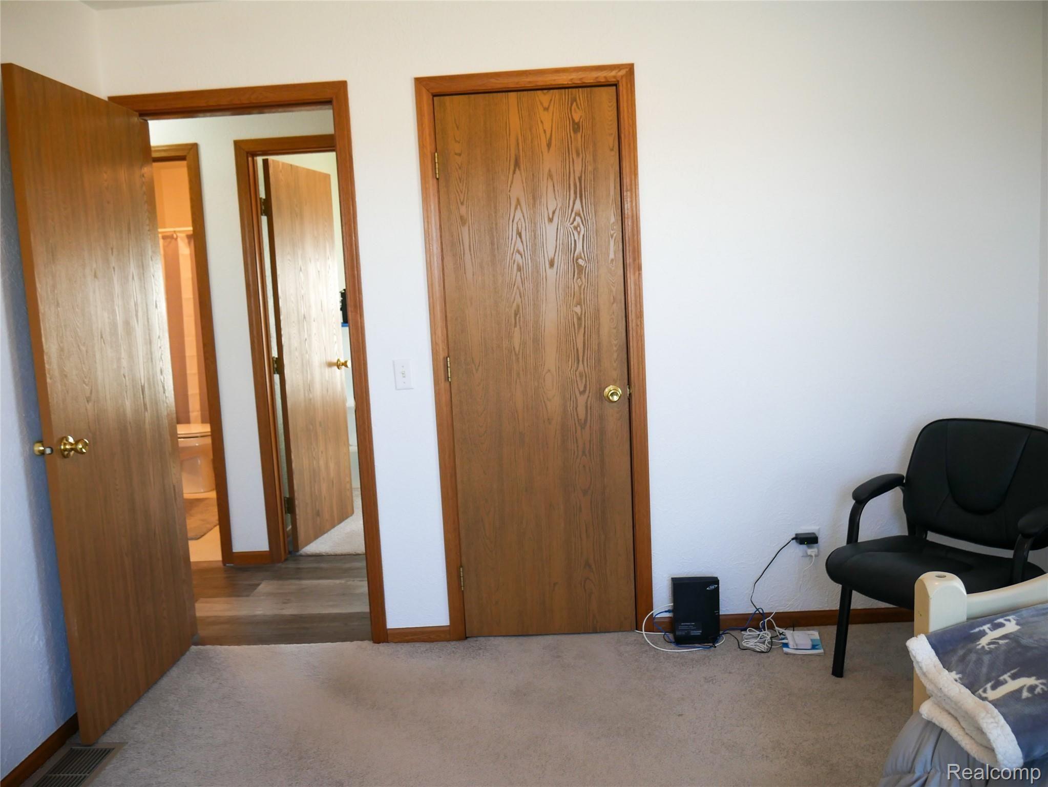 11595 West Sober Road Webberville, MI 48892 - Photo 29 of 42 11595 bedroom 3 2.jpg