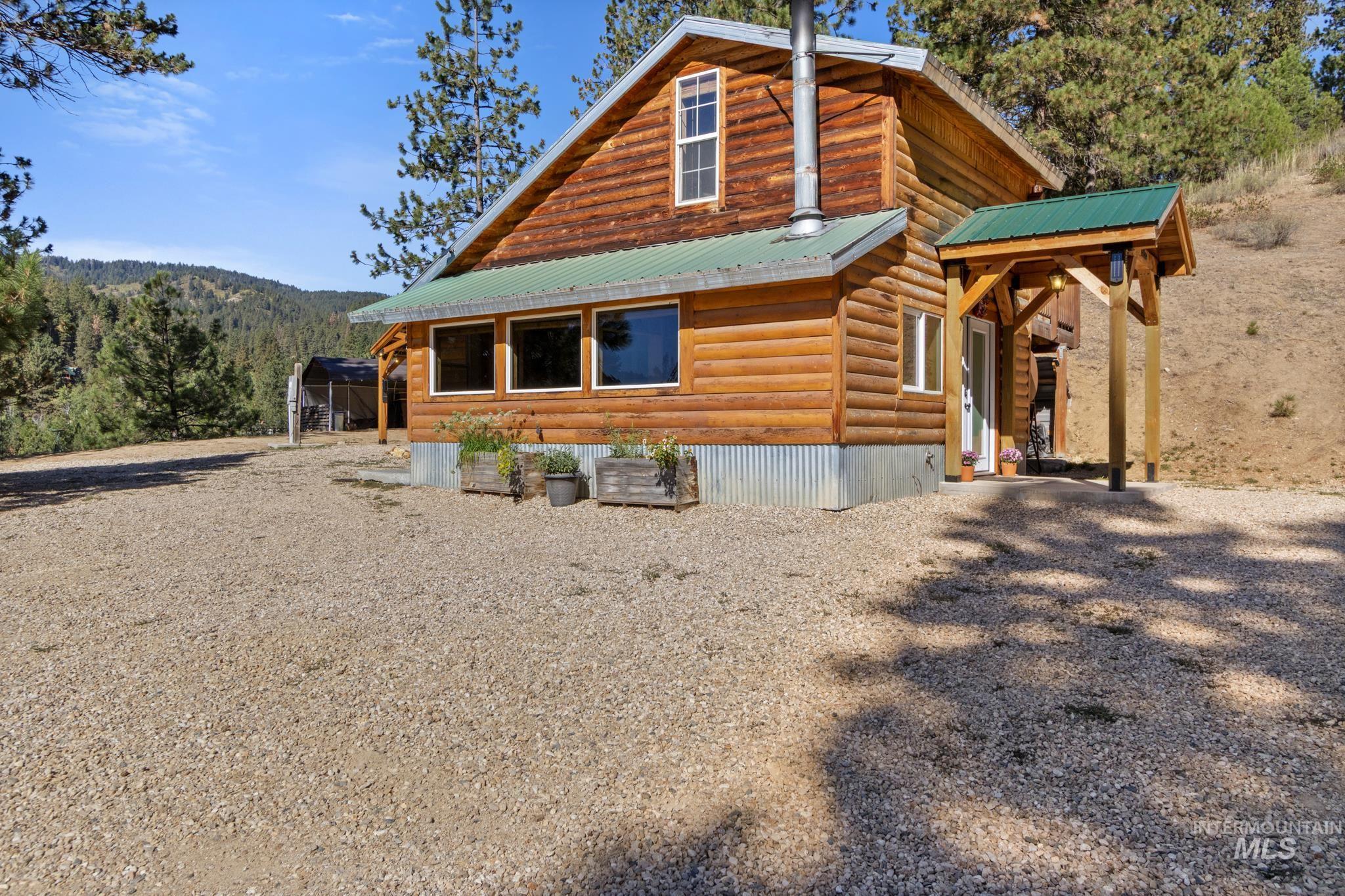 41 High Mountain Road Boise, ID 83716 - Photo 1 of 1 View of side of property featuring a metal roof