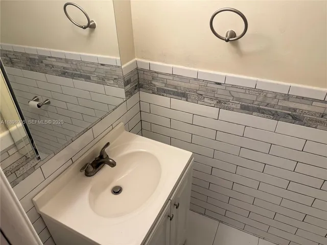 a bathroom with a toilet and a sink