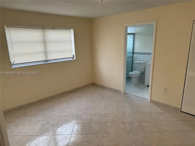 a utility room with a sink a washer and dryer