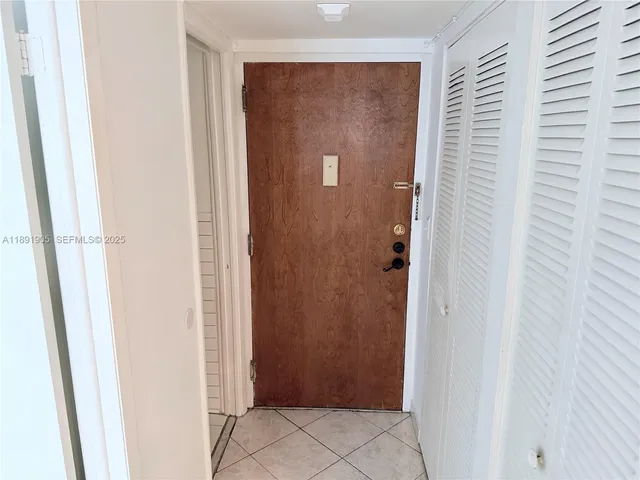 a kitchen with stainless steel appliances a stove a sink and a microwave