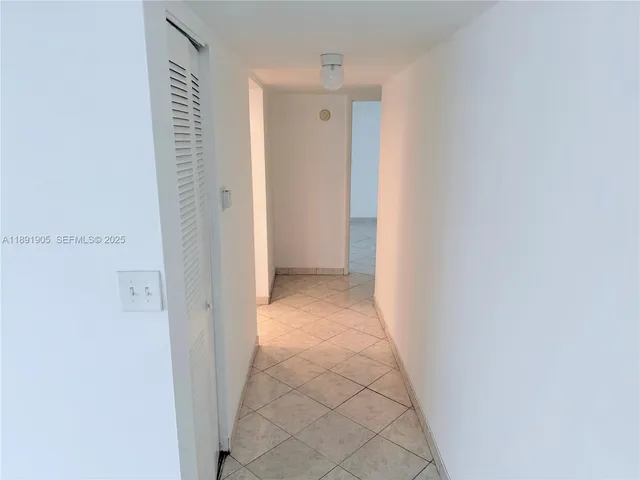 a kitchen with stainless steel appliances a refrigerator and a sink
