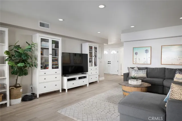 a living room with furniture and view of living room