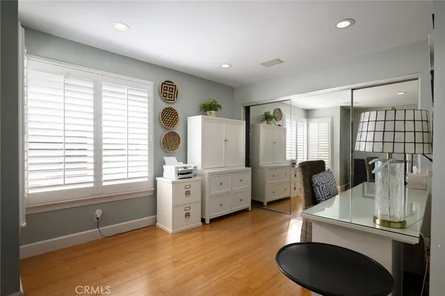 a kitchen with stainless steel appliances granite countertop a sink and a window