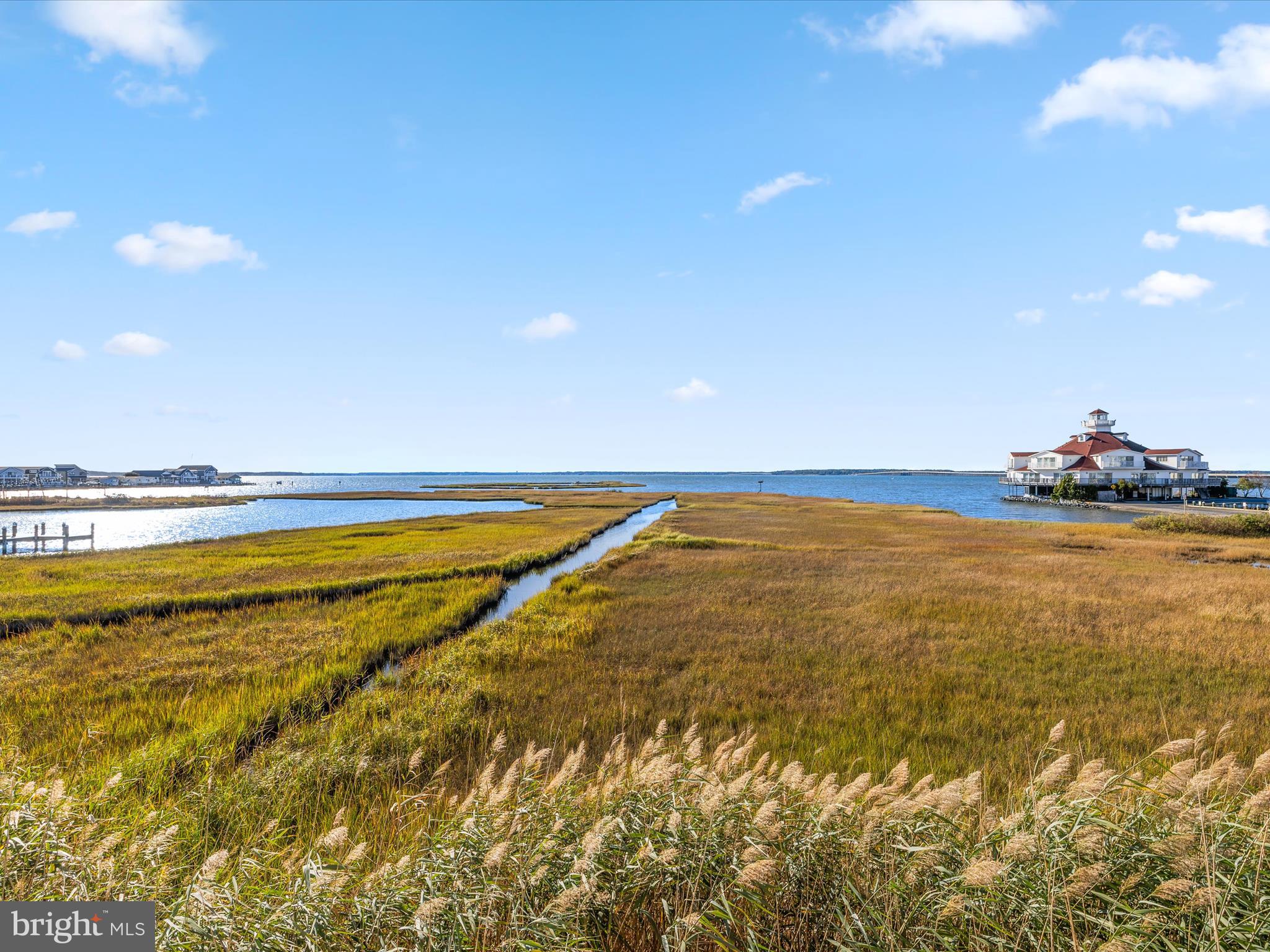 105 56th Street, Unit 205 P1 Ocean City, MD 21842 - Photo 30 of 40 a view of an ocean and beach