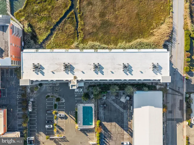 a view of a swimming pool and an ocean view