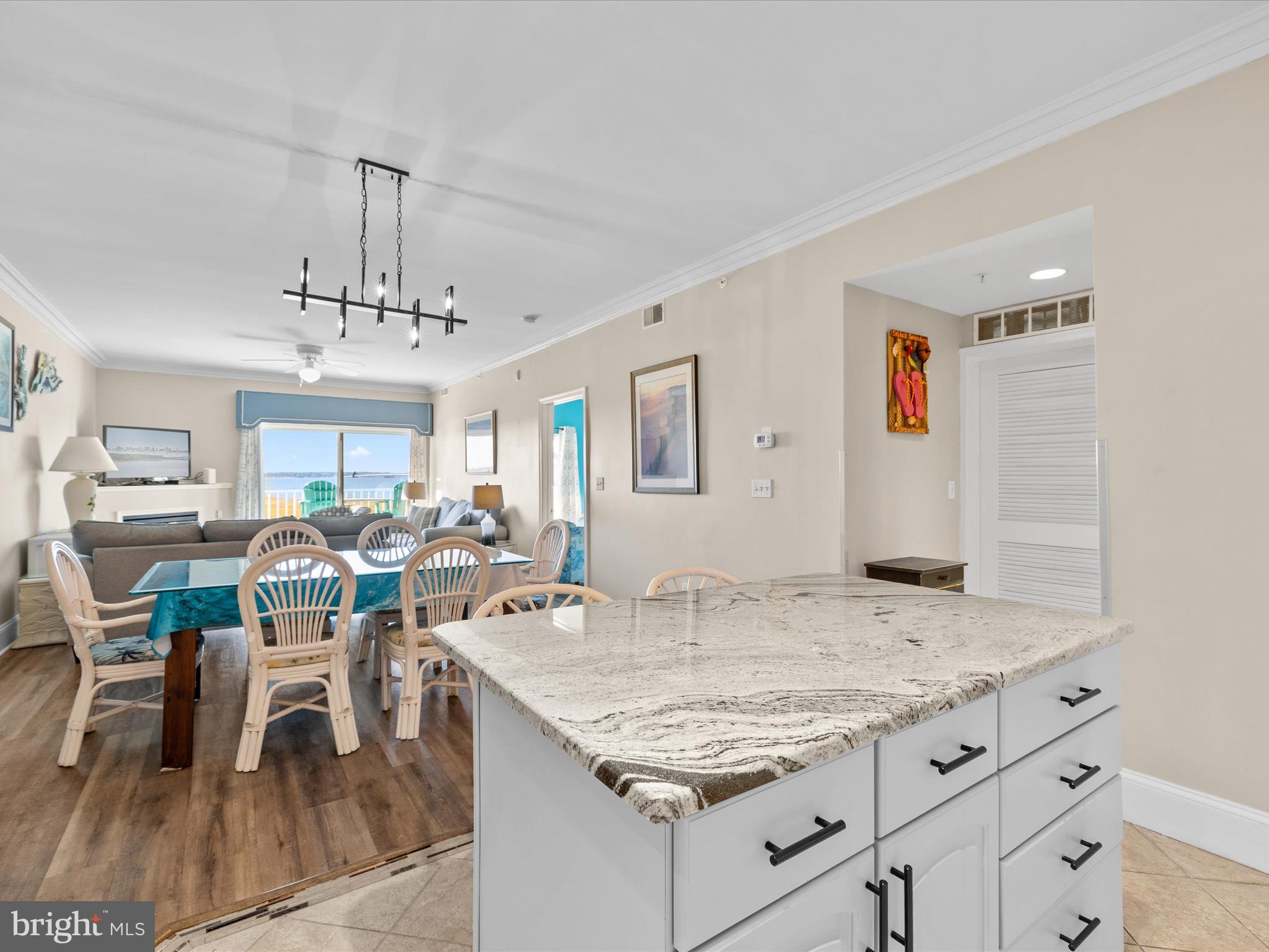 105 56th Street, Unit 205 P1 Ocean City, MD 21842 - Photo 8 of 40 a view of a dining room and livingroom view