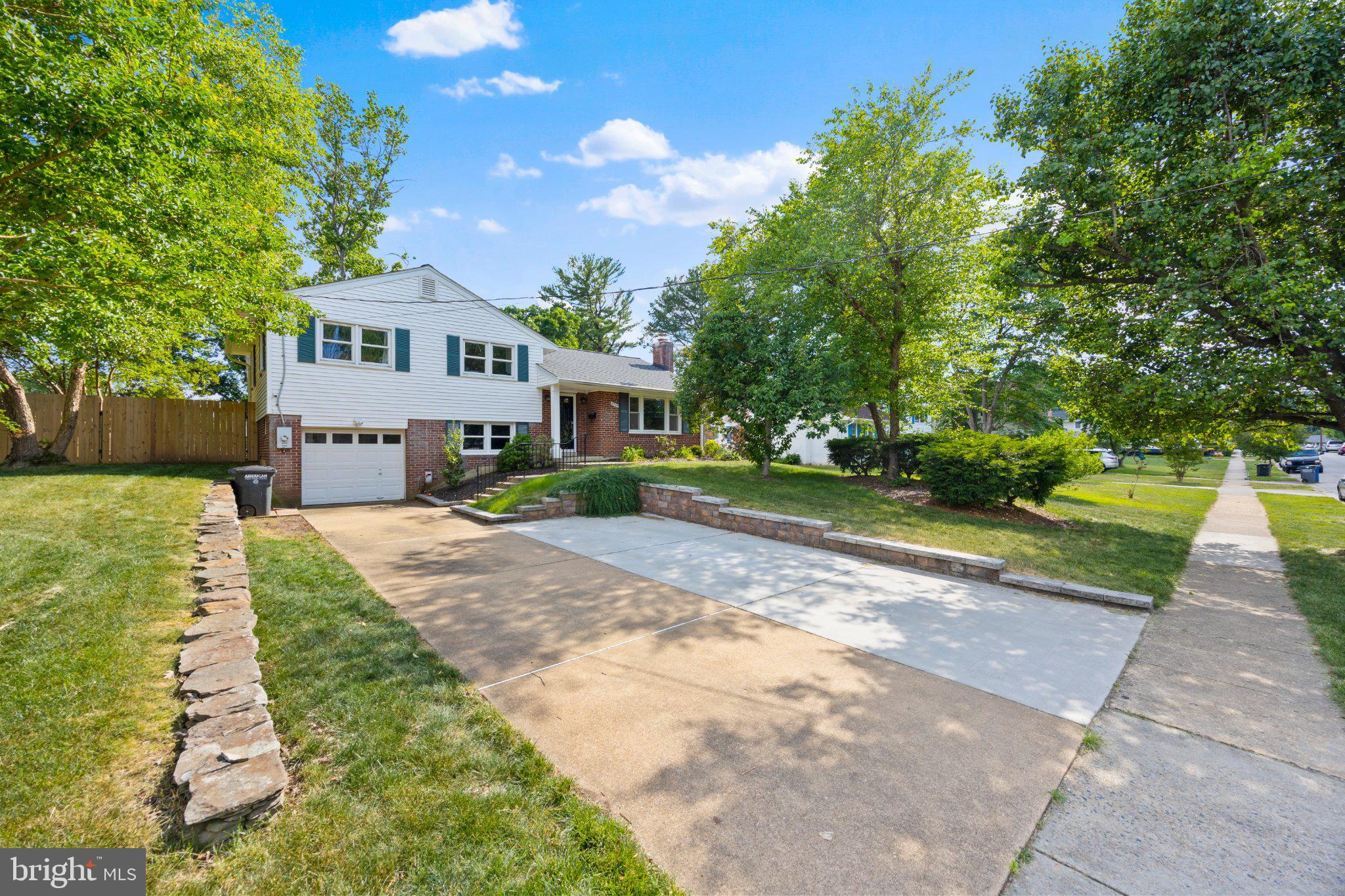6705 New Hope Drive Springfield, VA 22151 - Photo 3 of 67 Charming home with lush greenery.