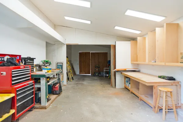 a kitchen that has a lot of cabinets in it
