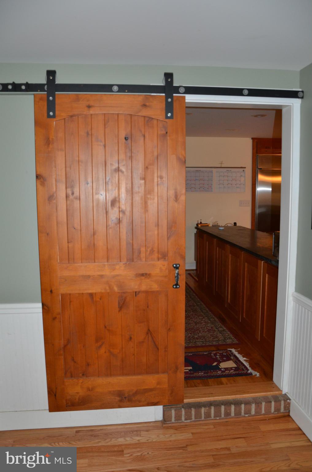 9795 Mill Point Road Easton, MD 21601 - Photo 12 of 30 Door from Family Room to Dining Room