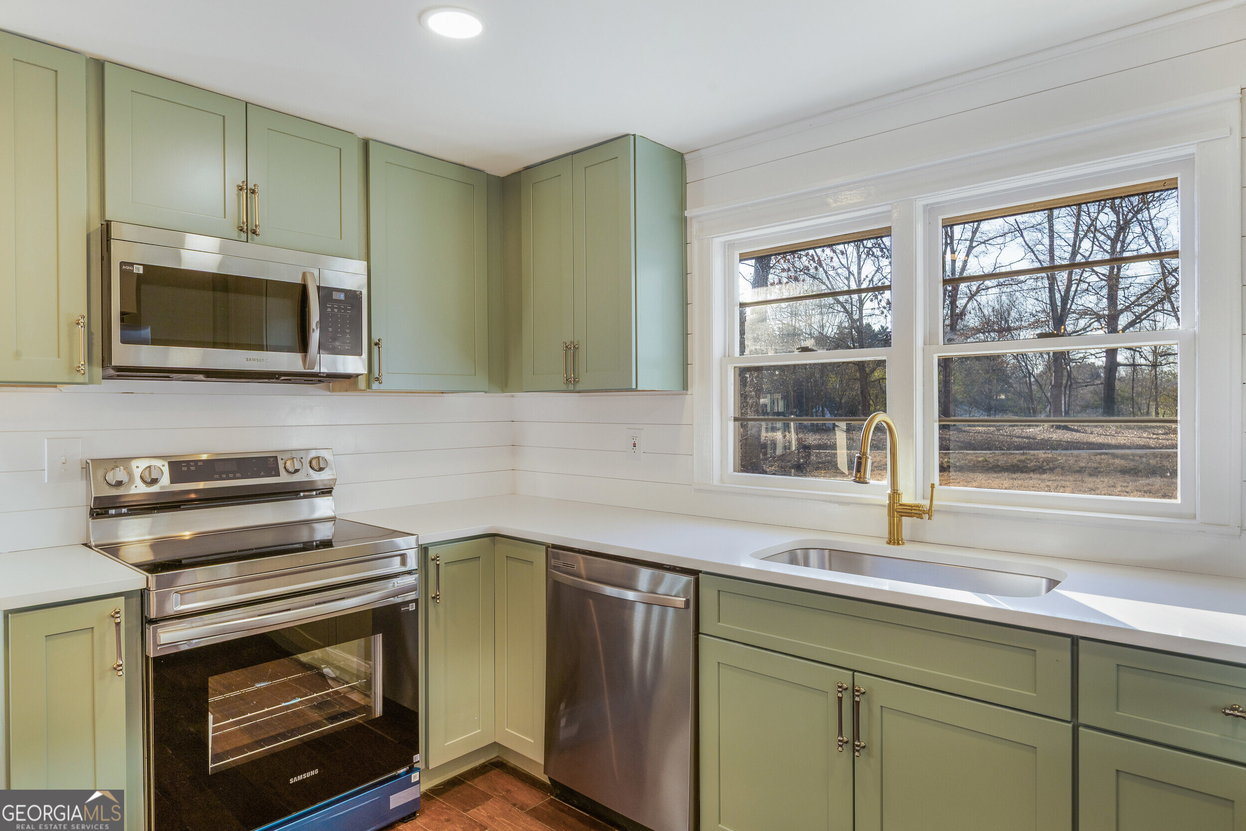 103 Campground School Road Dallas, GA 30157 - Photo 17 of 25 a kitchen with sink cabinets and window