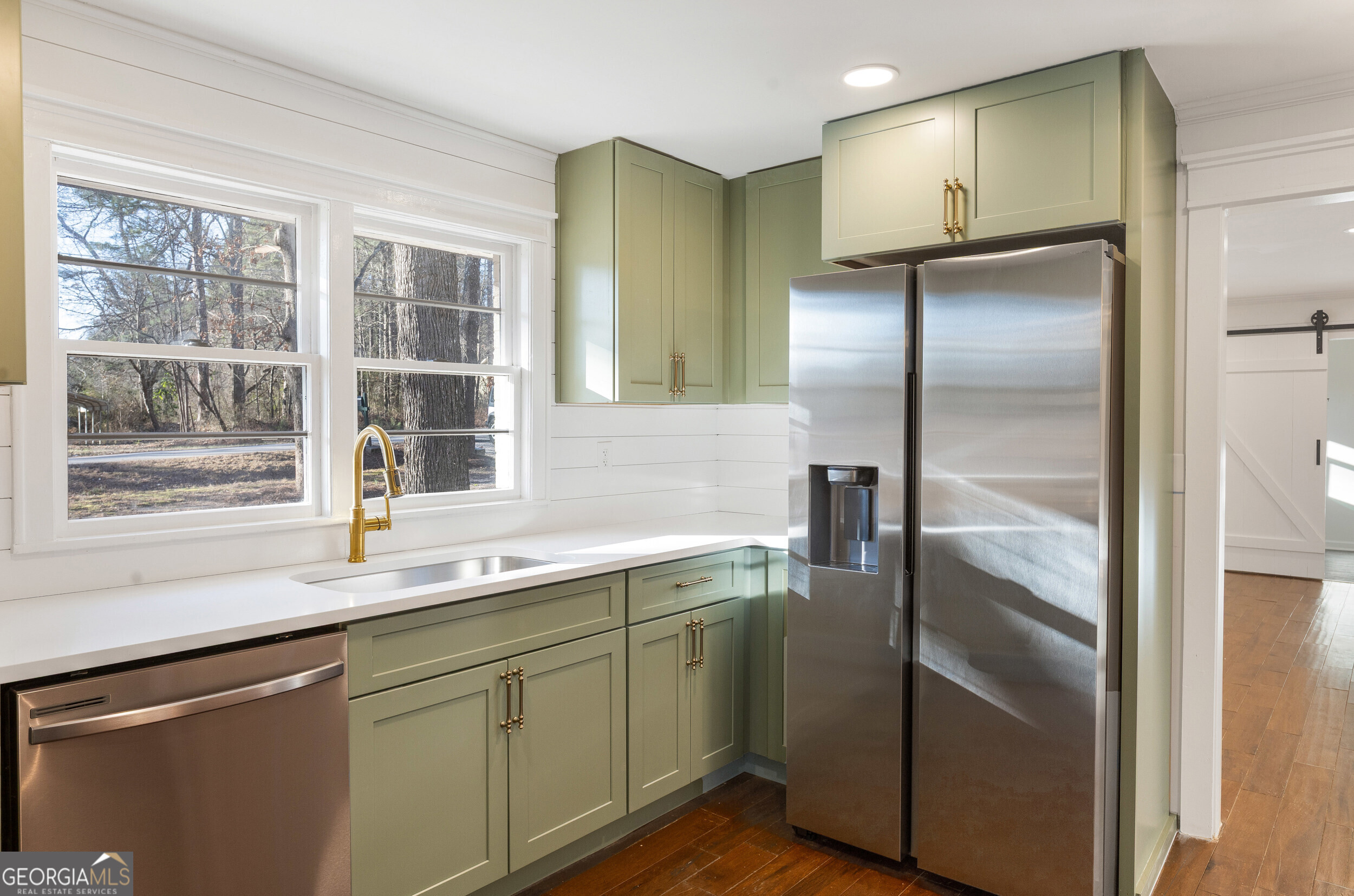 103 Campground School Road Dallas, GA 30157 - Photo 18 of 25 a kitchen with a refrigerator and a sink