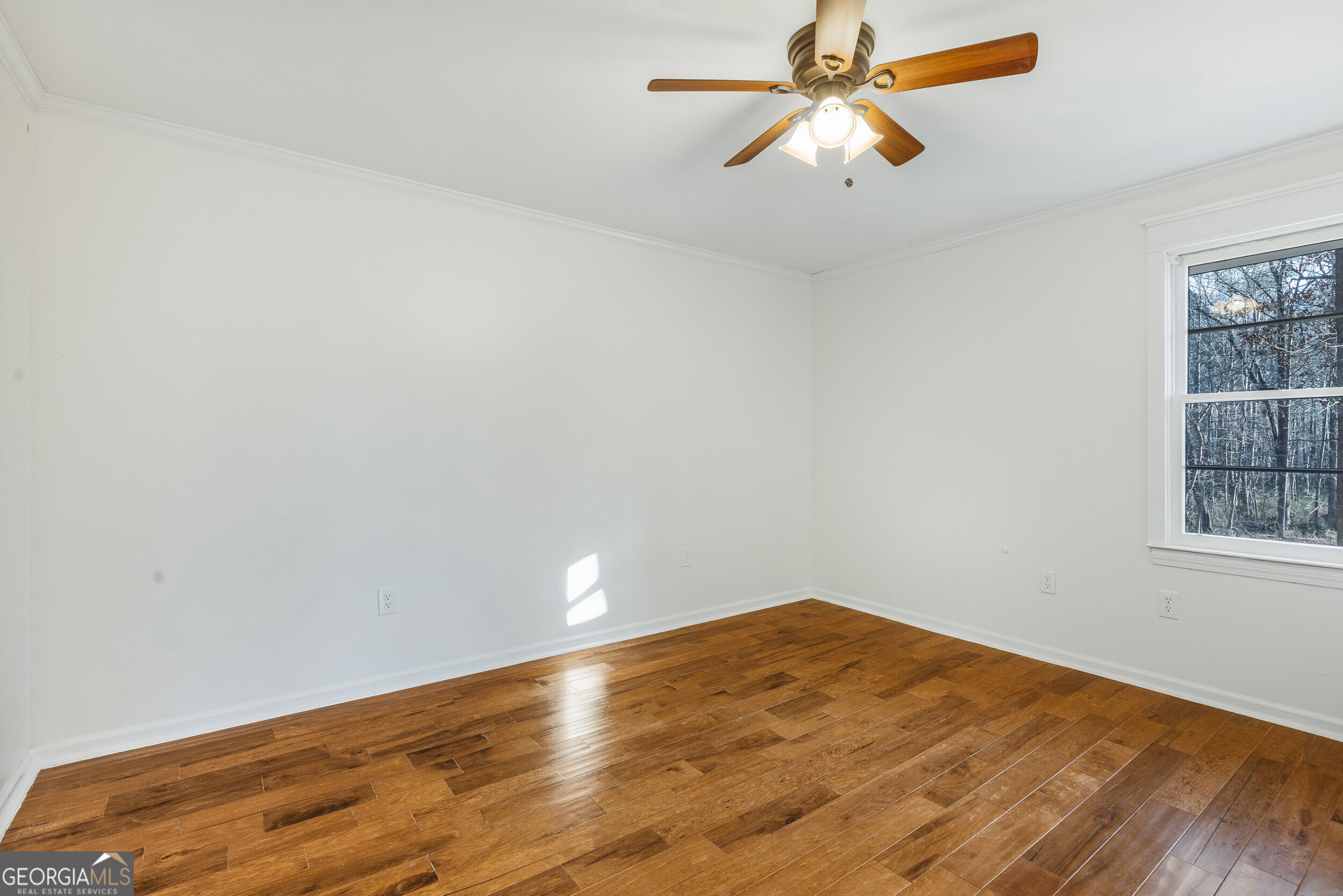 103 Campground School Road Dallas, GA 30157 - Photo 20 of 25 an empty room with a window and a ceiling fan