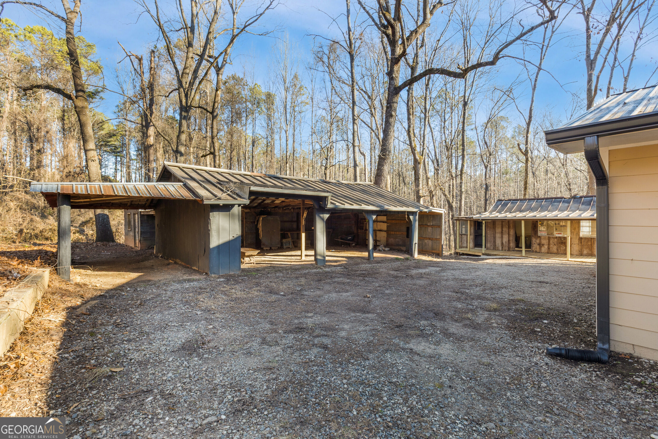 103 Campground School Road Dallas, GA 30157 - Photo 23 of 25 a view of a large building with a large tree