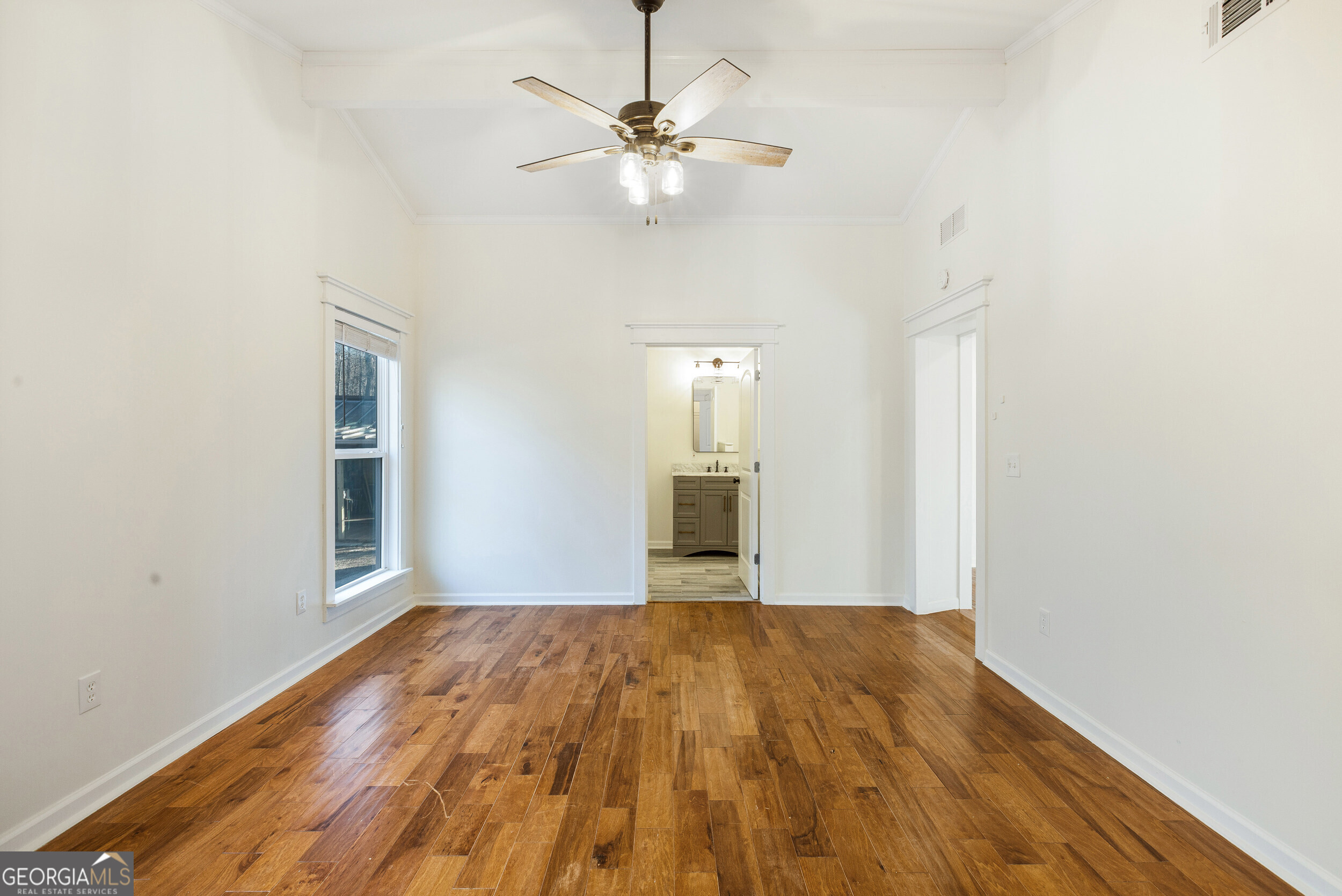 103 Campground School Road Dallas, GA 30157 - Photo 9 of 25 a view of empty room with wooden floor and ceiling fan