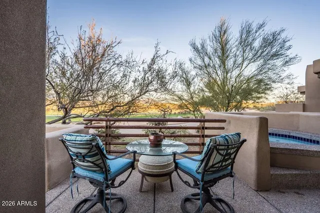a view of backyard space and tree