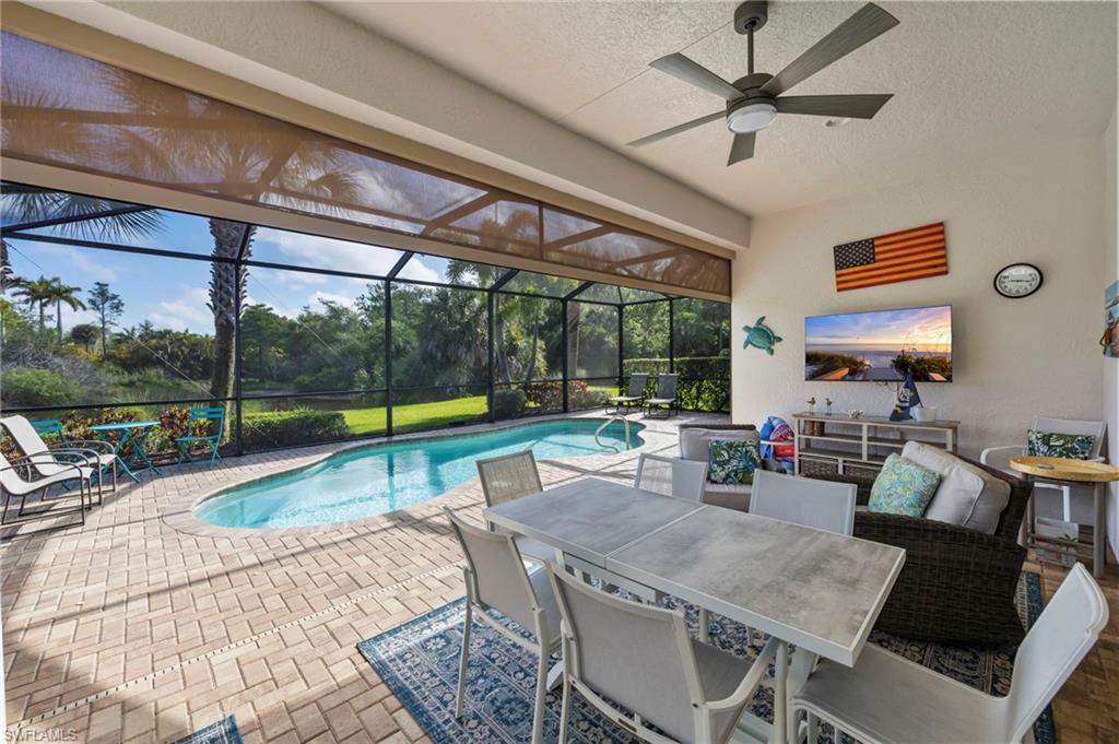 1287 Manado Drive Naples, FL 34113 - Photo 20 of 32 a view of a dining room with furniture window and outside view