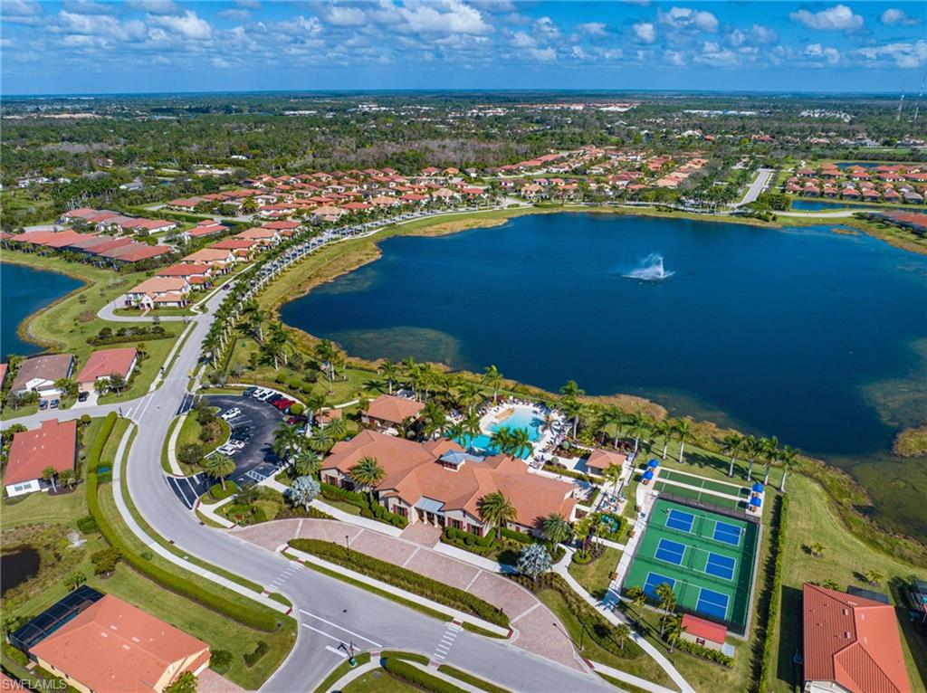 1287 Manado Drive Naples, FL 34113 - Photo 31 of 32 an aerial view of a residential houses with outdoor space
