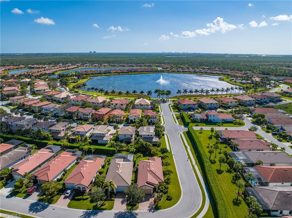 1287 Manado Drive Naples, FL 34113 - Photo 32 of 32 an aerial view of residential houses with outdoor space