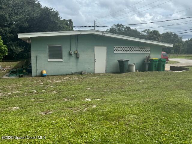 2840 West Jay Jay Road Titusville, FL 32796 - Photo 6 of 8 a house with a yard