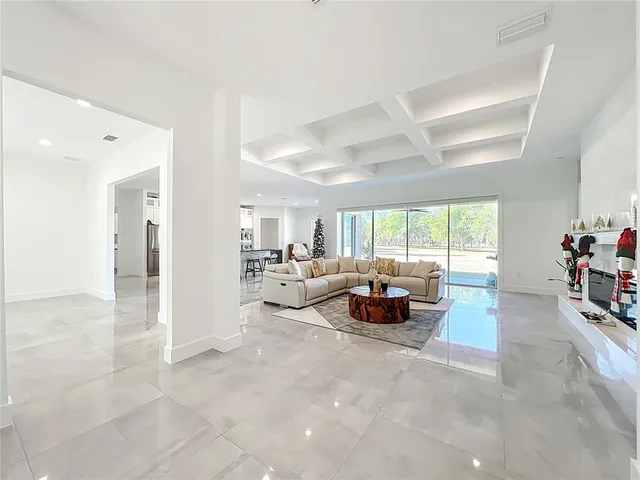 a kitchen with stainless steel appliances a sink and cabinets