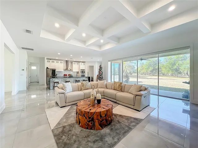 a kitchen with granite countertop a sink and a counter top space
