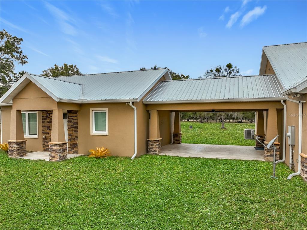 540 Northwest 165th Ct Road Dunnellon, FL 34432 - Photo 2 of 85 a front view of a house with garden