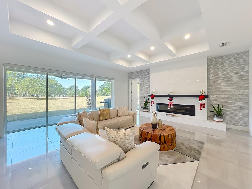 540 Northwest 165th Ct Road Dunnellon, FL 34432 - Photo 24 of 85 a living room with furniture and a large window