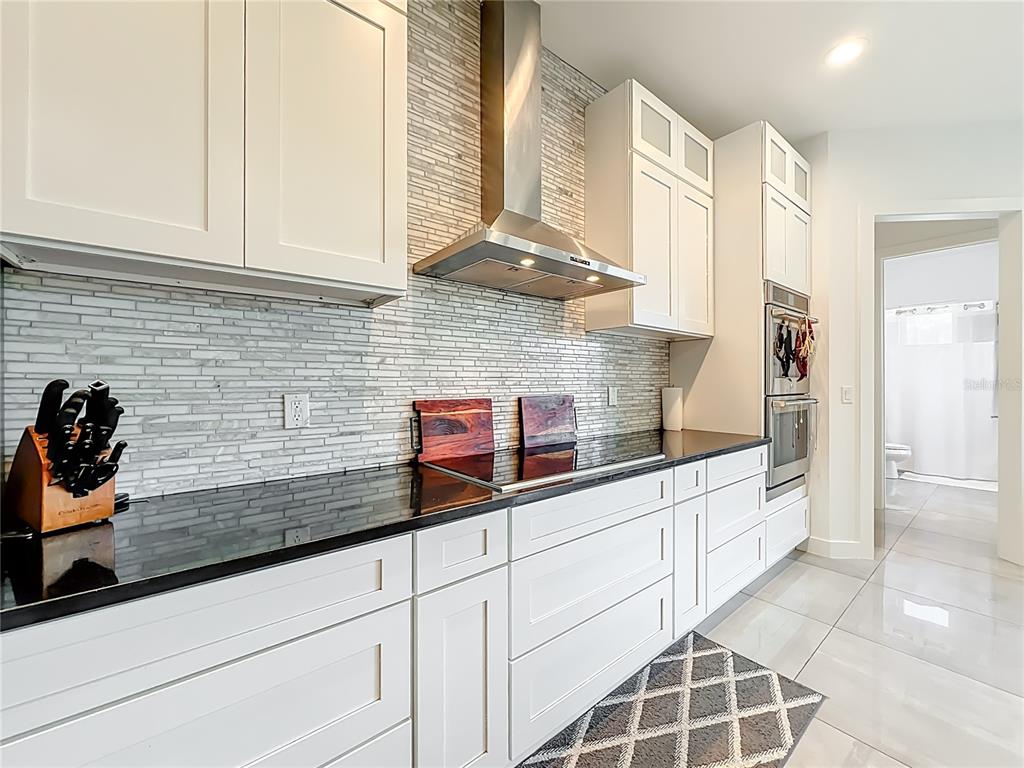 540 Northwest 165th Ct Road Dunnellon, FL 34432 - Photo 26 of 85 a kitchen with stainless steel appliances a sink and cabinets