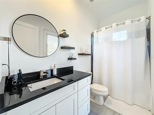 a view of empty room with windows