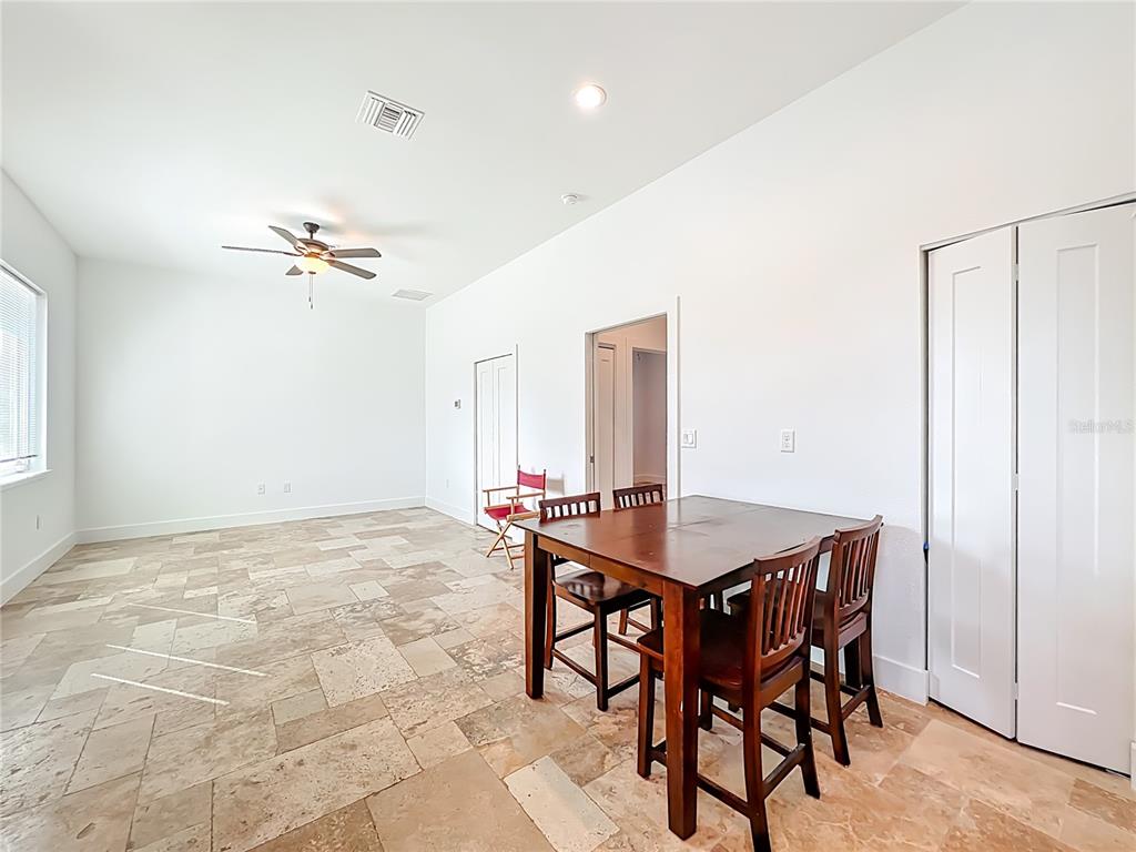 540 Northwest 165th Ct Road Dunnellon, FL 34432 - Photo 46 of 85 a view of a dining room with furniture
