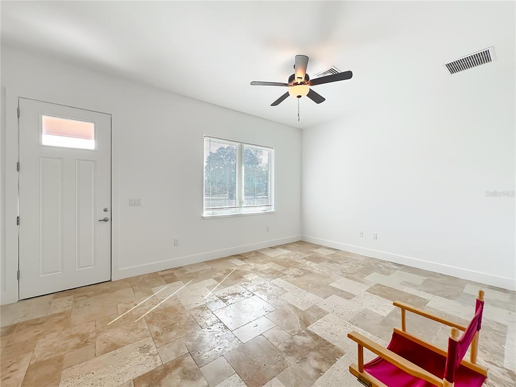 540 Northwest 165th Ct Road Dunnellon, FL 34432 - Photo 49 of 85 a view of empty room with windows