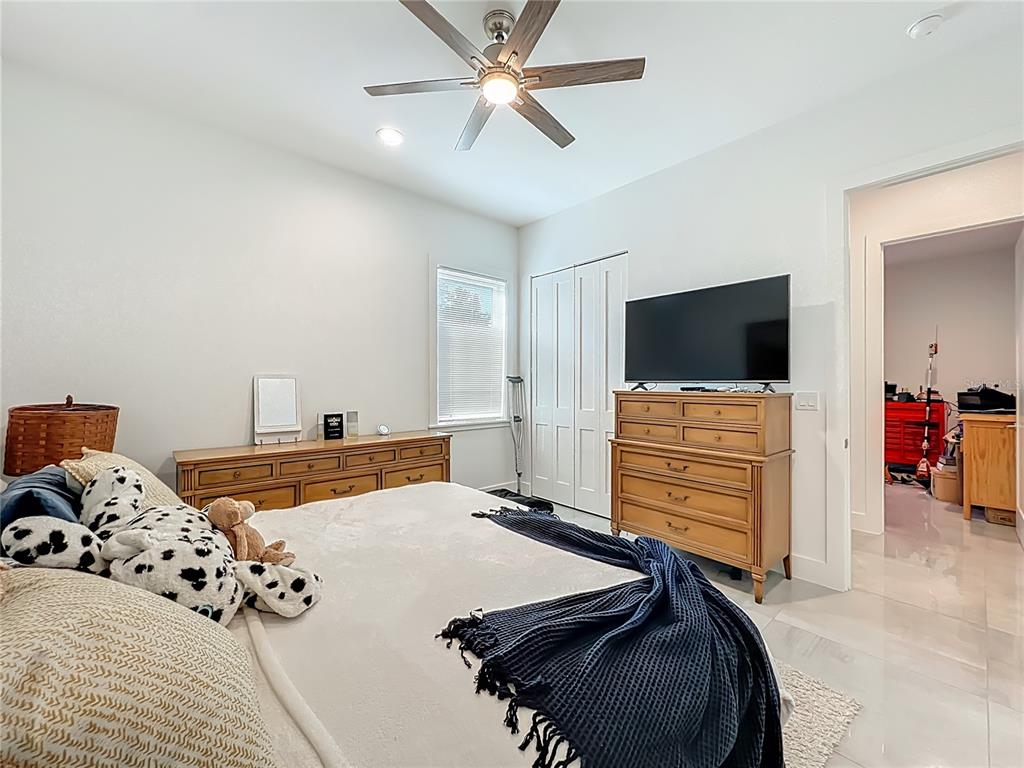 540 Northwest 165th Ct Road Dunnellon, FL 34432 - Photo 55 of 85 a bedroom with a bed and flat screen tv